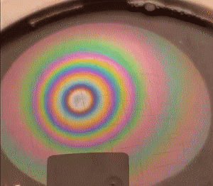animated image of light reflecting from a soap bubble